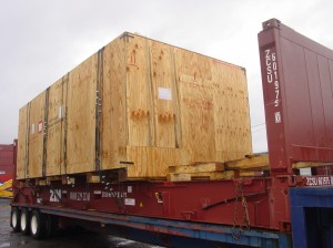Over dimensional crate on a flat rack