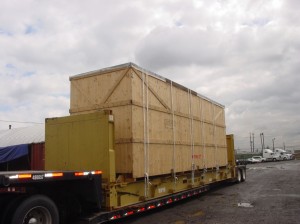over dimensional crate loaded on flat rack