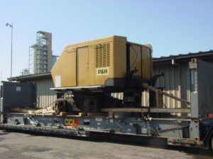 over dimensional machinery loaded onto a flat rack