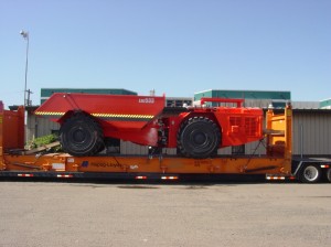 over dimensional machinery loaded onto a flat rack