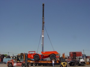 over dimensional machinery loaded onto a flat rack