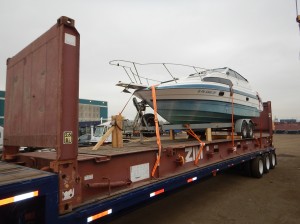 boat loaded onto a flat rack