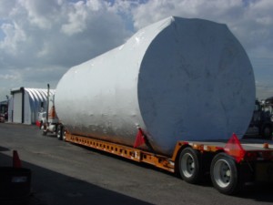 Picture of large tank or silo loaded onto a double drop low boy trailer