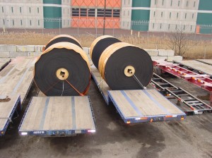 picture of coils stored on step deck trailers