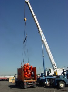 Crane lifting train engine